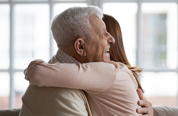 Two family members hugging