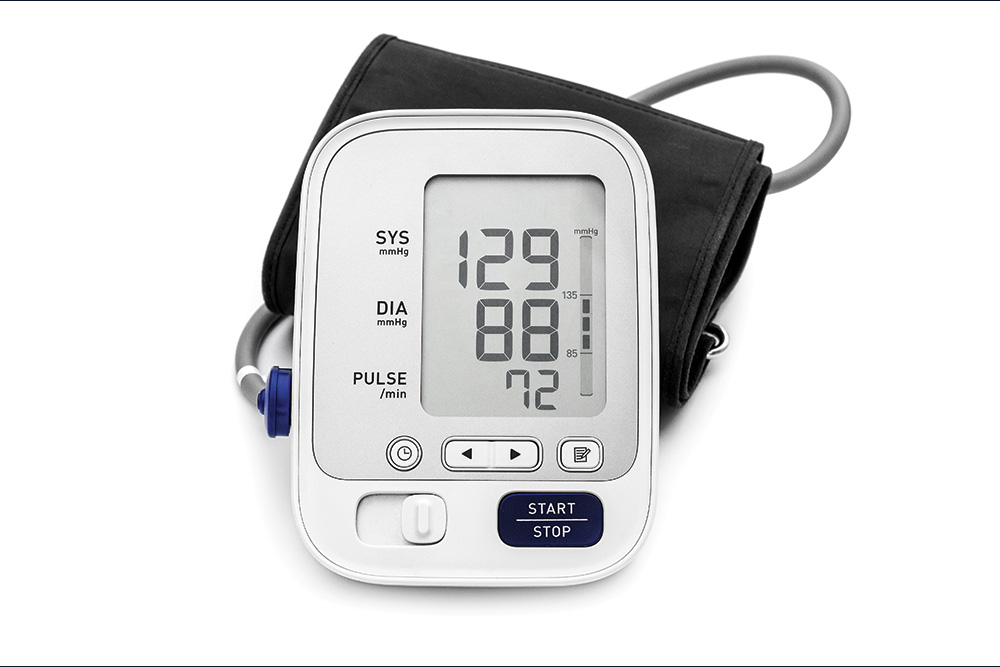 A blood pressure machine registers a reading of 129 systolic mm Hg over 88 diastolic mm Hg