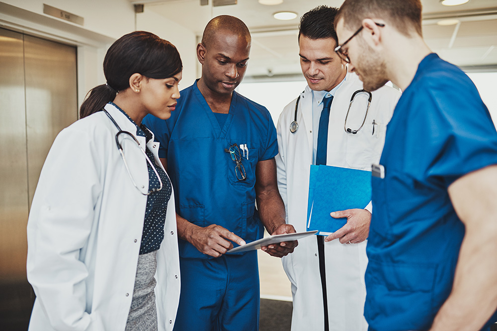 Physicians collaborate on a multidisciplinary practice and interprofessional practice model.