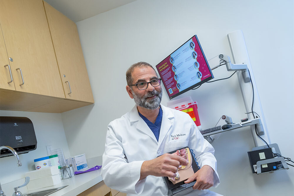 Dr. Leo Doumanian consults with a patient at USC Verdugo Hills Hospital